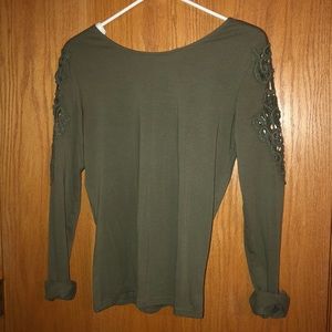 See through shoulders floral print. Swoops in back